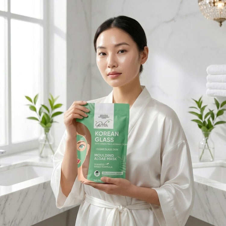 Woman holding Korean glass molding algae mask pouch, 450g
