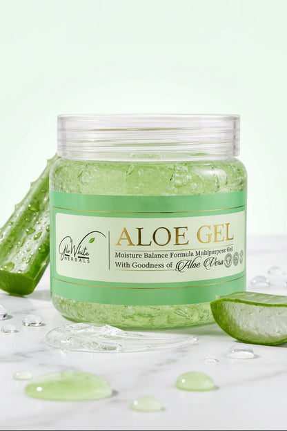 GloWhite Herbals Aloe Gel jar with fresh aloe vera leaf pieces on marble surface